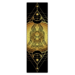 Detailed view of mystical golden moon and meditating figure on black hanging tapestry