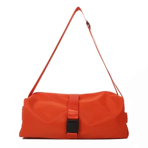 Large orange Oxford cloth crossbody bag with adjustable strap and buckle closure