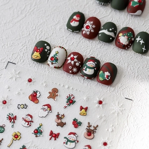 3D embossed Christmas nail art stickers featuring Santa, reindeer and snowflakes patterns