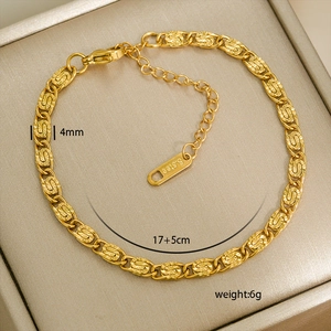Close-up of 4mm gold-plated stainless steel chain bracelet with S.steel stamp and lobster clasp