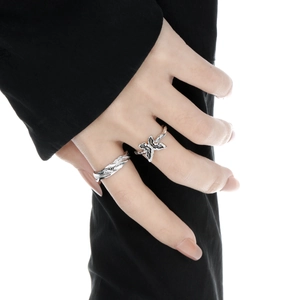 Silver S925 butterfly and braided texture rings set worn on female model finger