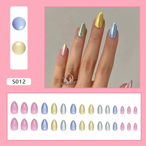 Short almond press-on nails with metallic aurora finish in various fashion colors