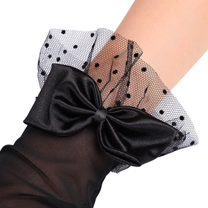Elegant black bridal gloves with polka dot mesh, satin bow, and lace ruffles