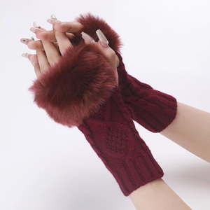 Detailed view of burgundy cable knit fingerless gloves with soft faux fur trim cuffs