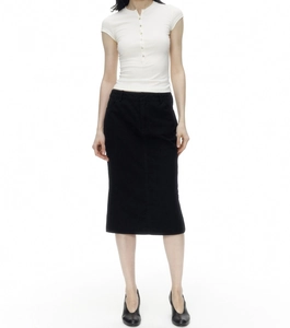 Detail of shell buttons on white slim-fit Henley shirt with ribbed texture and stretchy fabric