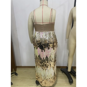 Detail of satin bodice and sequin patchwork with back hidden zipper on evening dress