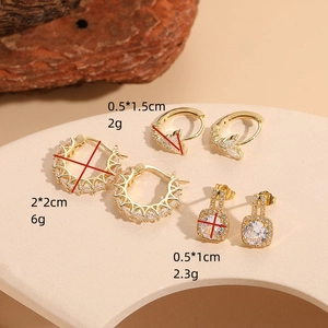 Three-pair gold zircon earring set with hoops, leaf studs, and square drop charms