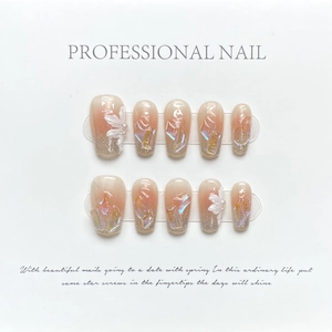 Handmade gradient pink press-on nails with 3D white flowers and silver glitter decoration