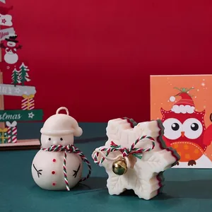 Christmas candle gift set featuring snowman and snowflake designs for festive home decor