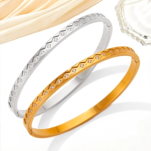 Polished stainless steel geometric bracelets with sparkling zircons in gold and silver