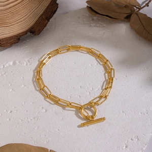 Double-layered 18K gold paperclip chain necklace with a stylish OT toggle clasp closure