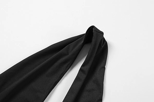 Macro shot of black halter neck straps and smooth elastic fabric of the sexy mini dress