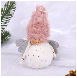 Close-up of pink plush angel Christmas tree ornament on a festive green branch background