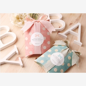 Vintage green and pink polka dot pillow boxes with ribbons for jewelry gift packaging