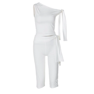 Detail of white one-shoulder tie-up top and high-waist cropped leggings set texture
