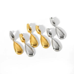 Modern 18K gold and silver stainless steel teardrop earrings with a polished finish