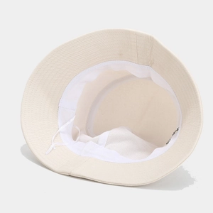 Beige cotton bucket hat with adjustable inner drawstring and moisture-wicking sweatband