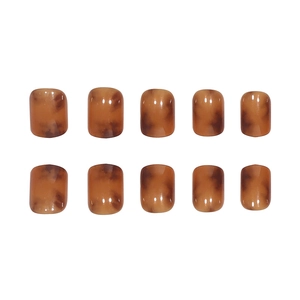 Caramel amber tortoise shell press-on nails with gradient glaze finish in 24-piece set