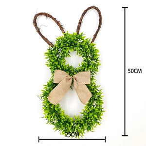 Detail of 50x25cm artificial rabbit wreath with green leaves and burlap bow decoration