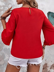 Women's red ruffle flare sleeve chiffon top with back button detail and solid color