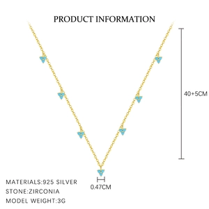 Macro detail of S925 silver necklace featuring 40+5cm length and blue zircon triangle charms