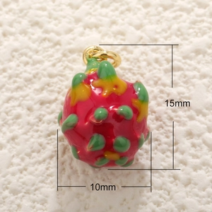 Macro shot of 15x10mm pink dragon fruit pendant with gold loop for jewelry making