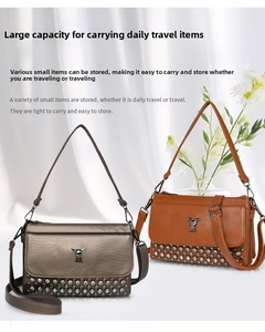 Detail of soft PU leather crossbody bags with animal buckle and studded bottom finish