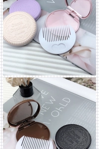 Detail view of the portable chocolate cookie mirror and comb set in various pastel colors
