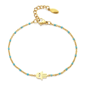Detail of gold chain bracelet with blue beads and Hamsa Hand evil eye charm pendant
