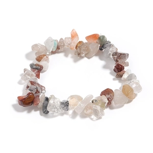 Macro shot of irregular multi-color natural quartz crystal gravel bracelet for women
