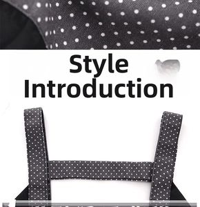 Detail of gray polka dot canvas apron showing shoulder straps and fine stitching work