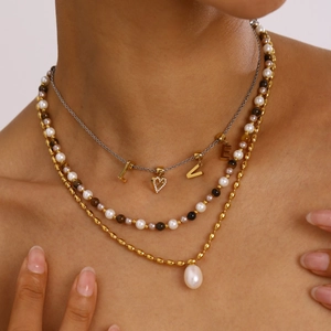 Detailed layered necklace set with pearl, Tiger Eye stone, and LOVE heart pendant
