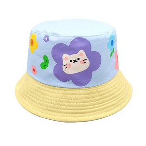 Close-up of color-block kids bucket hat featuring a cute cartoon cat and flower print