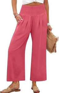 Détail du pantalon rose à taille haute et jambe large avec taille élastiquée plissée