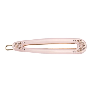 Detailed close-up of a pink acetate hair clip featuring delicate champagne rhinestones
