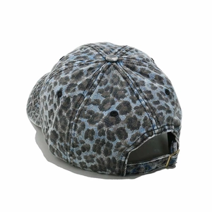 Rear view of washed leopard baseball cap with adjustable metal buckle and blue-grey pattern