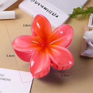 Detailed size view of a pink and orange gradient flower hair claw clip for women