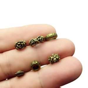 Antique bronze floral spacer beads for DIY jewelry making and handmade bracelets