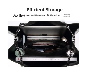 Interior view of black litchi leather tote bag showing large capacity and chain strap