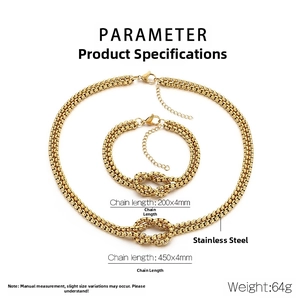 Detail view of gold stainless steel knot link necklace and bracelet set with lobster clasp