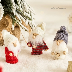 Three-piece knitted Santa Claus figurines with plush beards for Christmas tabletop decor