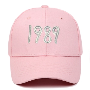 Close-up of pink 1989 embroidery detail on high-quality cotton canvas baseball cap
