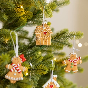 Cute gingerbread man and house Christmas tree ornaments with white hanging ribbons