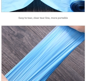Detail showing high tensile strength and durable blue flat-top plastic garbage bag roll