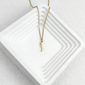 Minimalist gold stainless steel necklace with elegant red pepper chili horn pendant