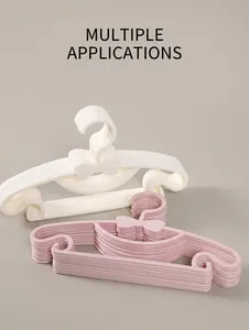 Detail of baby bow plastic hangers showing anti-slip hooks and thick material