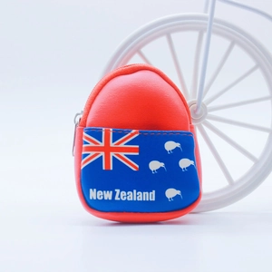 Detail of red and blue New Zealand souvenir mini backpack coin purse with zipper