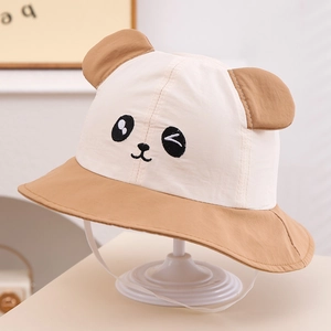 Detailed close-up of a panda bucket hat with 3D ears and adjustable chin strap