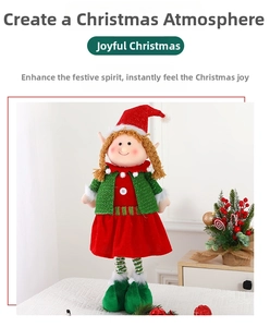 Detailed view of a Christmas elf plush with red hat and green knitted outfit on desk