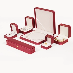Burgundy jewelry box set with gold crown emblem for rings necklaces and bracelets